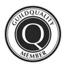 partner-1 A circular black and white badge with the text "GuildQuality Member" and a large letter "Q" in the center.